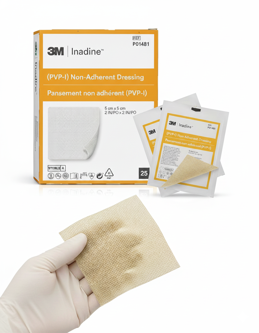 A box of 3M Inadine Non-Adherent Antimicrobial Dressings, with several individually wrapped dressings displayed in front of the box.