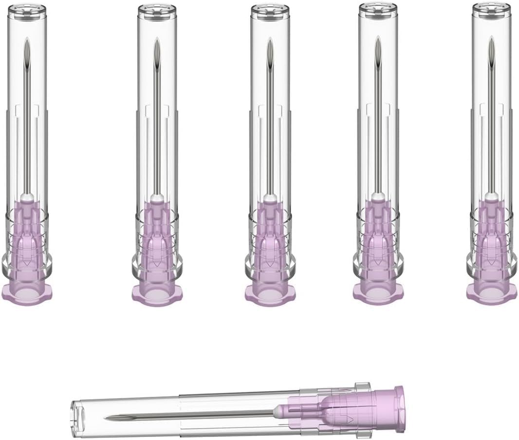 Set of five medical syringe needles with purple plungers on a white background